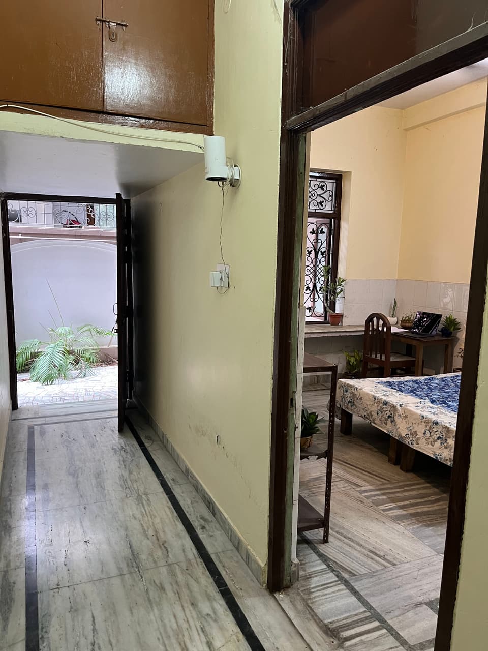 Room doorway and passage viewed from outside.