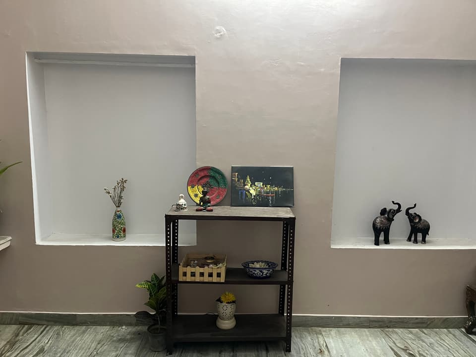 Wide interior angle showing furnished 1 RK layout.